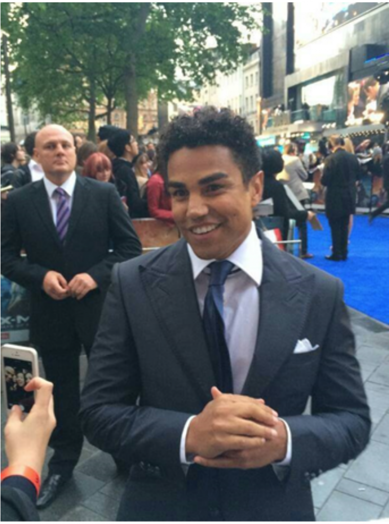 Photo showing our close protection behind a celebrity